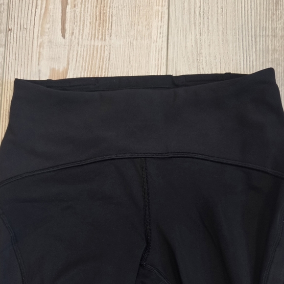 Lululemon Athletica Black Capri Leggings With Zipper Pocket & Mesh Down The Legs - Picture 5 of 10